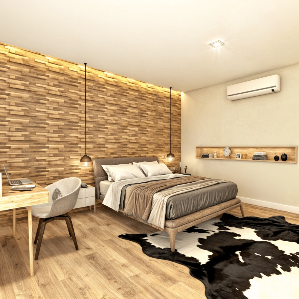 Descubre el dormitorio diseñado por Estudio Welfare en La Tahona, Canelones. Destacando un cabecero de madera y pisos claros, la moderna cama se complementa con una alfombra de cuero de vaca y una butaca Imola para relajarse junto al ventanal. Un pequeño escritorio nórdico y una TV en mueble flotante añaden funcionalidad sin sacrificar la ligereza del espacio. Disfruta de las vistas a los hermosos jardines desde el gran ventanal equinero.
