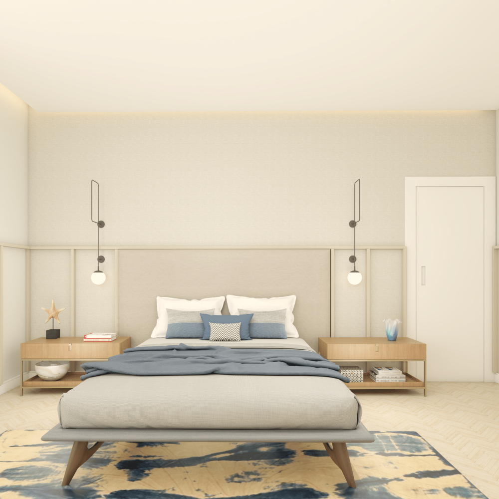 Vista del dormitorio en suite con cama escandinava, respaldo tapizado y detalles en bronce cepillado, en una casa contemporánea frente al mar en Solís, Canelones, Uruguay.