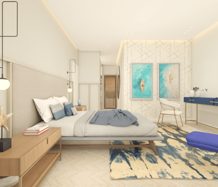 Vista del dormitorio en suite con cama escandinava, respaldo tapizado y detalles en bronce cepillado, en una casa contemporánea frente al mar en Solís, Canelones, Uruguay.